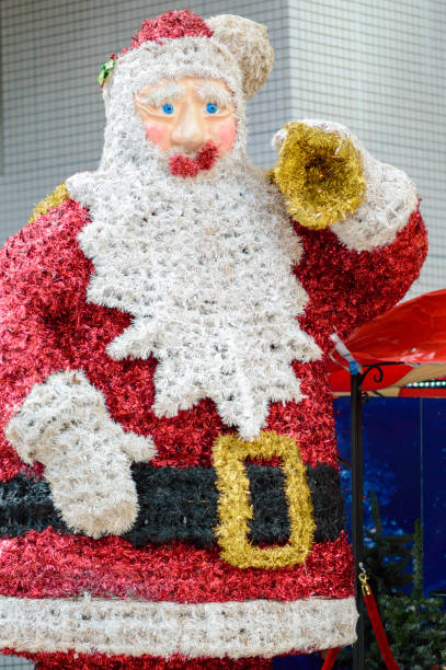 istock Merry Christmas Santa Clause illuminated stand, holidays decorations selective focus 2190522497
