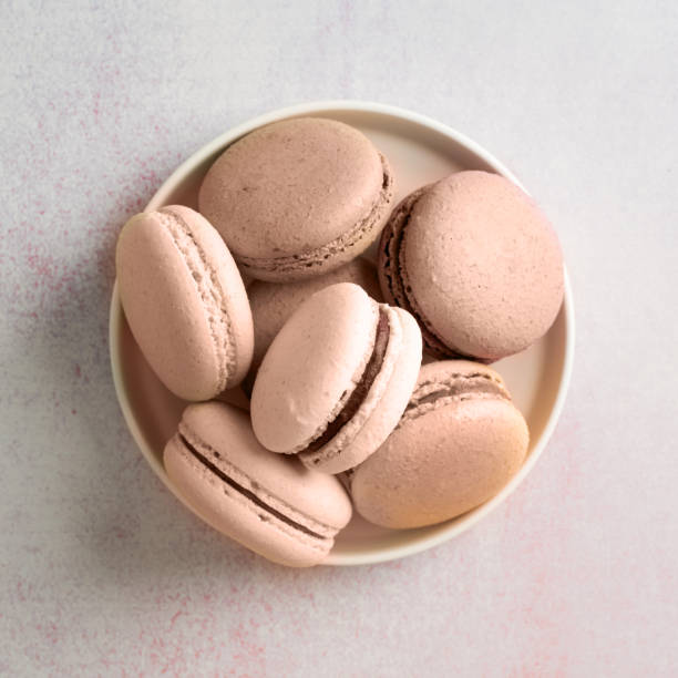 istock Mocha Mousse - color of the year 2025. Stack of macarons, macaroons 2190523341