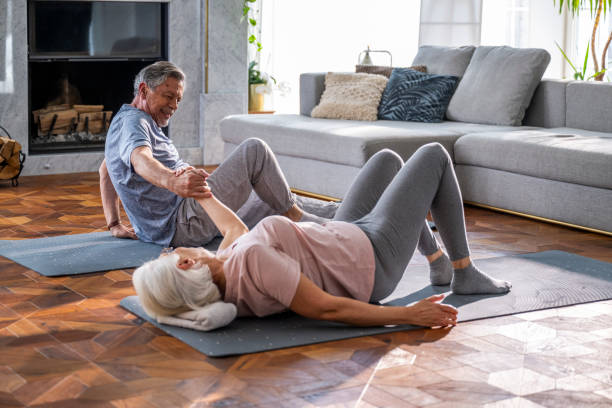 istock Senior Couple Sharing a Joyful Moment During Exercise 2190533175