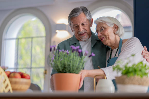 istock A Shared Passion: Happy Senior Couple Caring for Indoor Plants 2190533725