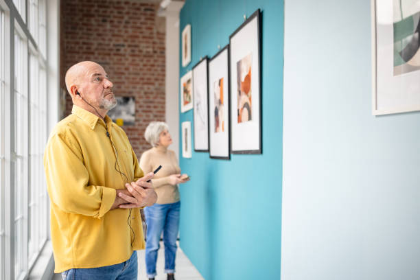 istock Visitors Admiring Art in a Contemporary Gallery Setting 2190536238