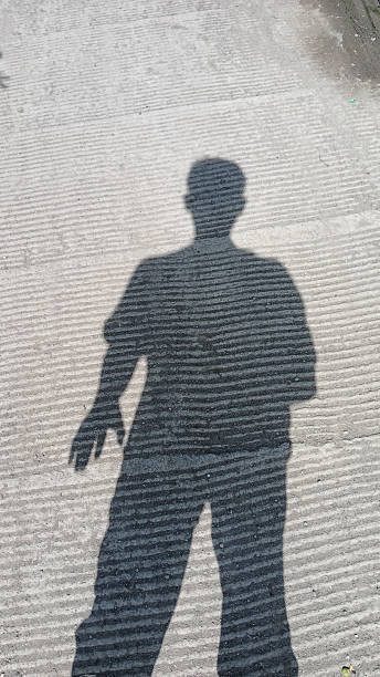 istock Silhouette of a disabled person with only one hand 2190539696