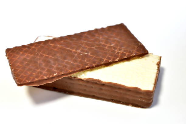 Confectionery product wafer in chocolate on a white background.