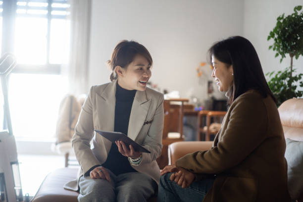 istock two asian businesswoman using digital tablet 2190543082