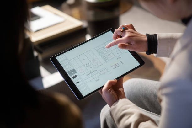 istock two asian businesswoman using digital tablet 2190543107