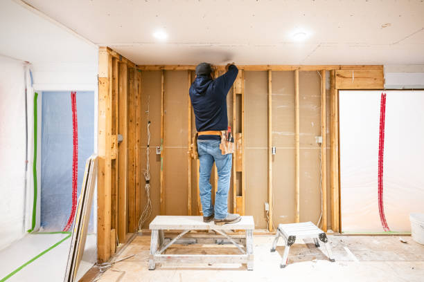 istock Drywall installers working in kitchen renovation 2190550051