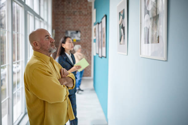 istock Visitors Exploring Art Exhibits in a Contemporary Gallery Setting 2190551341