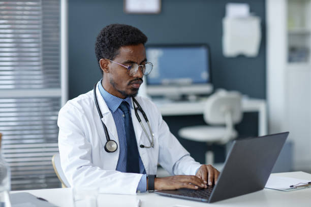 istock Black Man as Doctor in Clinic 2190554643