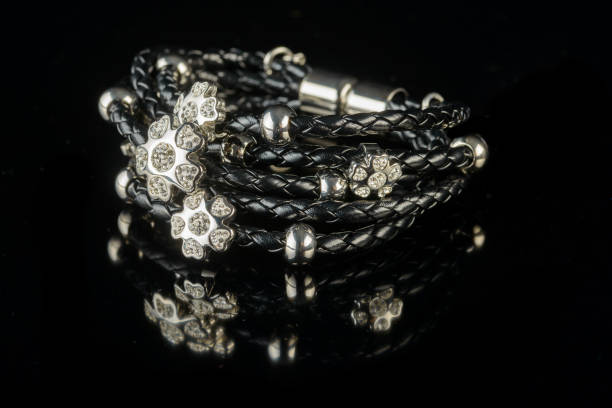 jewelry and bracelets on a black background