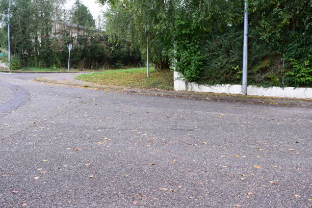 istock wide street with bad asphalt 2190555866