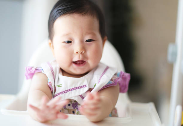 istock Cute baby girl indoor. 2190557972