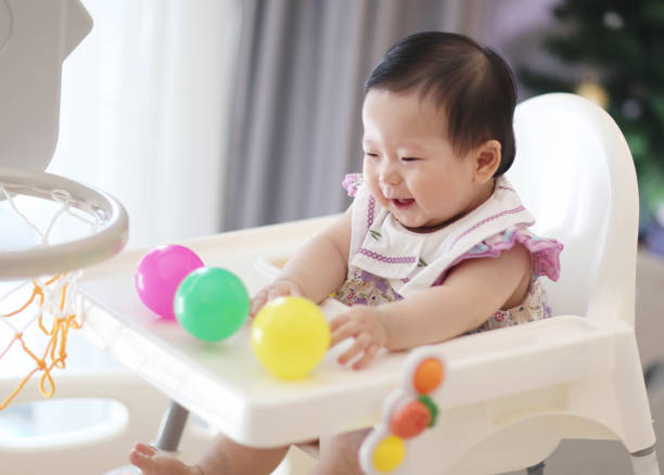 istock little child is playing with sensory balls 2190558040