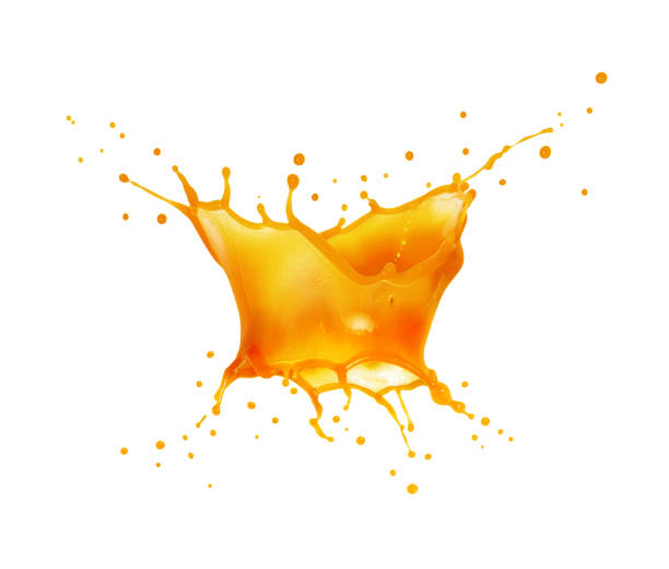 istock Splashes of fresh orange juice isolated on a white background 2190558676