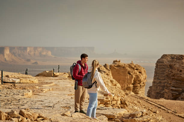 istock Couple exploring famous Edge of the World in Riyadh 2190560285
