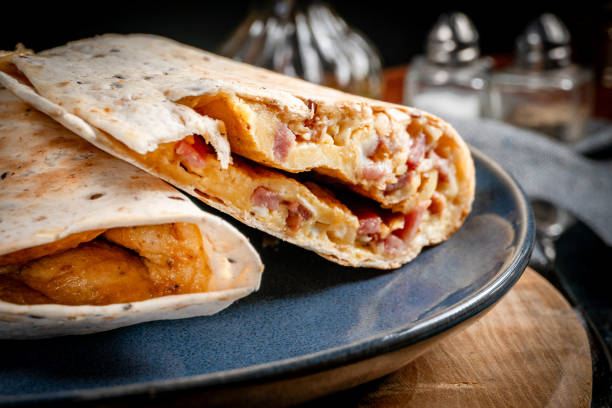 istock Tortilla multigrain with omelette, sausage and bacon. 2190561618