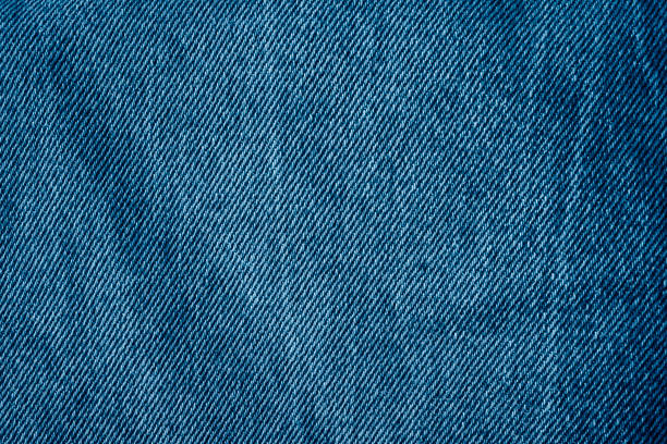 istock Texture of vintage blue jeans with abrasions. 2190561796