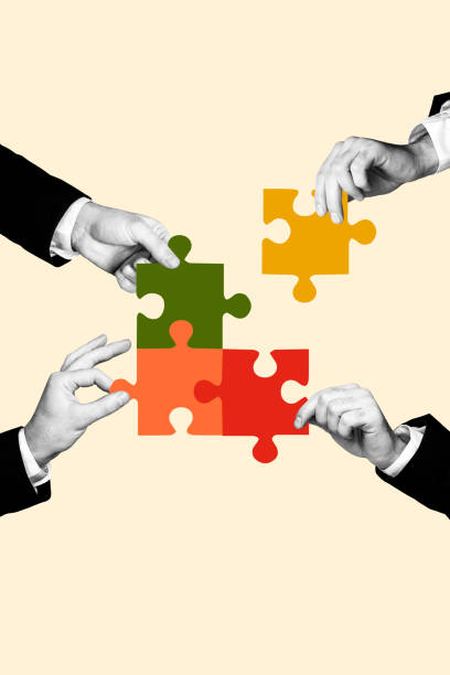 istock Vertical photo collage creative of four people coworkers have aim achieve solving work task connect all puzzle piece on beige background 2190562520