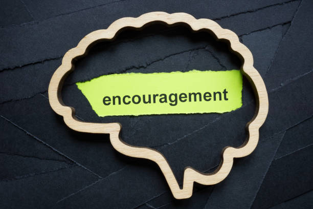 istock Brain with the word encouragement. Positive thinking concept. 2190562709