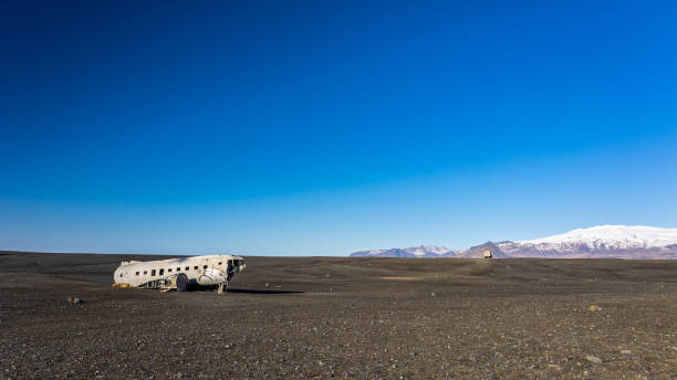 istock Road to wrecked plane in Iceland 2190563940
