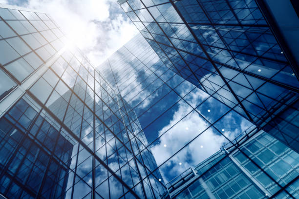 istock Modern Glass Office Buildings Reflecting Sky 2190565084