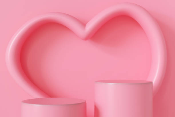 istock Minimalistic Valentine's Day product display with soft pink background, 3D heart-shaped decor, and two cylindrical podiums for showcasing products. Ideal for advertisements, product promotions. 2190566353