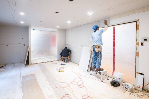 istock Drywall installers working in kitchen renovation 2190567520