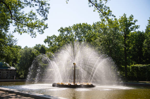 istock Fountain with water jets in a park on a sunny day. 2190569111