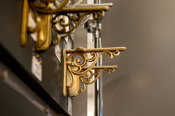 istock Decorative metal shelf brackets in various styles on display. 2190569117