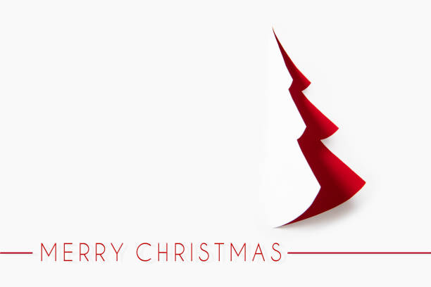 Paper Christmas tree with holiday message on red and white background