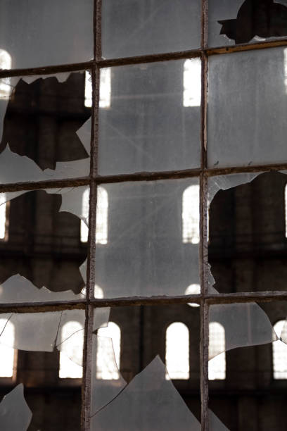 istock Broken Window in an Abandoned Factory Building – Abstract Background and Texture 2190576166