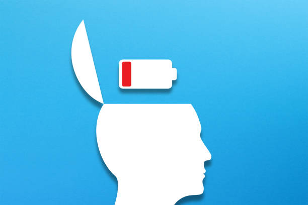 Human head with low battery icon on blue background. Mental health and problems with memory.