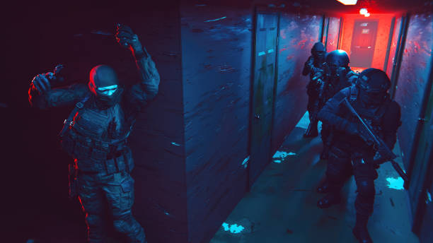 Tactical SWAT team in action. A terrorist is holding a knife and appears to be in a defensive or preparatory stance. Several SWAT team members are advancing cautiously down a dimly lit hallway, equipped with tactical gear and weapons. The red and blue lighting creates a tense and dynamic atmosphere, suggesting a high-stakes scenario such as a raid or rescue operation.