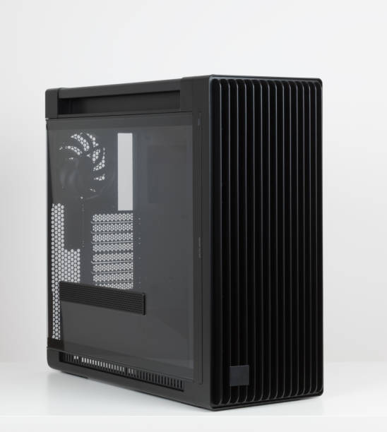 istock Side view of empty  big tower, PC case, chasis,  tempered-glass left panel has a mesh window to aid in graphics-card ventilation 2190589246
