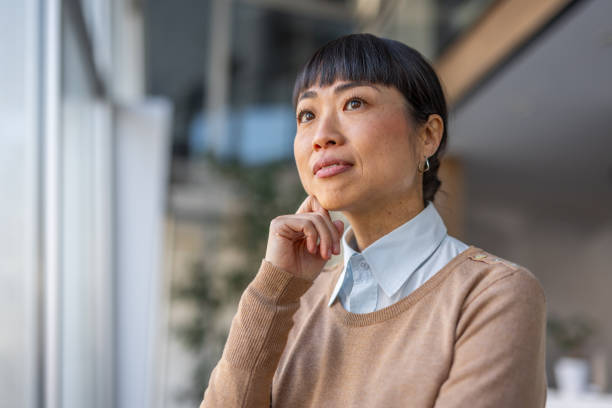 istock Asian lawyer with a serious expression, ready for a case 2190600432