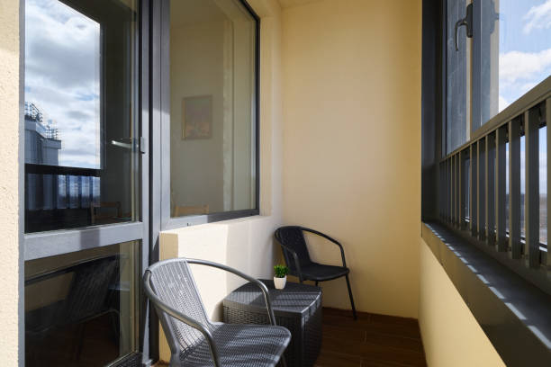 istock Enjoy a Cozy Balcony That Features Comfortable Chairs Alongside Breathtaking Scenic Views 2190600651