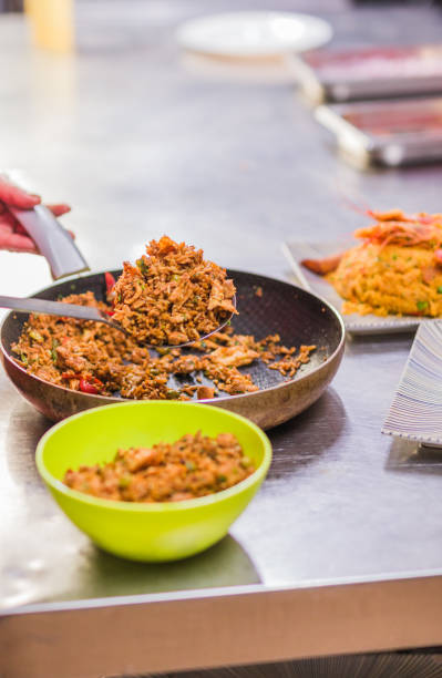 istock Chef preparing Chaulafan con marisco traditional ecuadorian dish in ecuadorian restaurant 2190601630