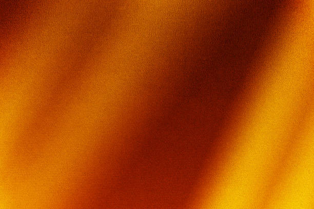 istock Black brown copper red burnt orange yellow background. Color gradient shadow. Silk satin fabric. Noise grain mesh. Bright light glow fire. Draped curtain line stripe. 2190605372