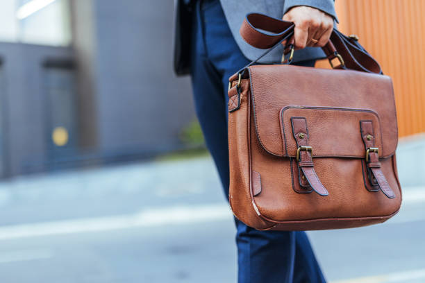 istock Business Professional Walking with Leather Briefcase on Street 2190606595