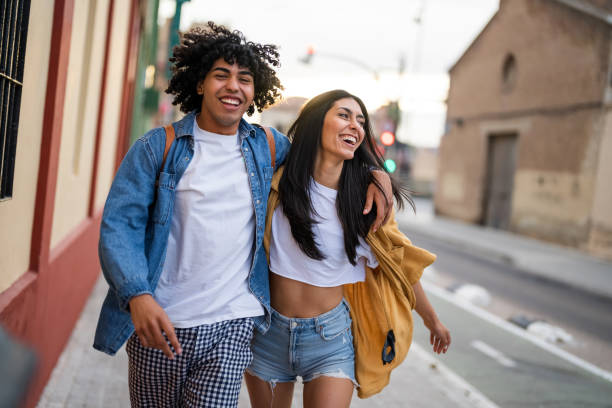 istock Joyful Diverse Couple Enjoying Urban Stroll 2190607262
