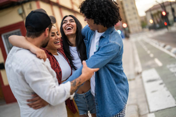 istock Urban Joy With Diverse Friends Embracing 2190607277