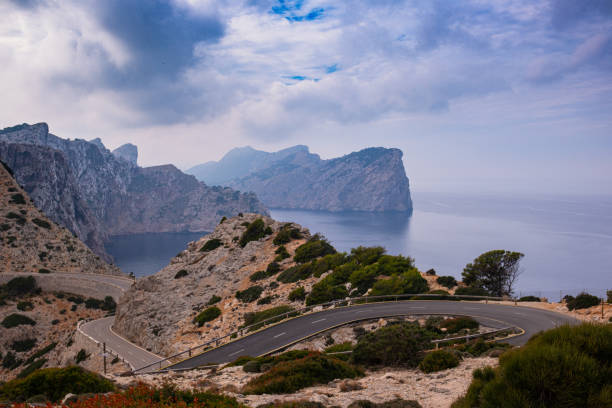 istock High cliffs jutting out far into the sea. Beautiful seascape 2190616112