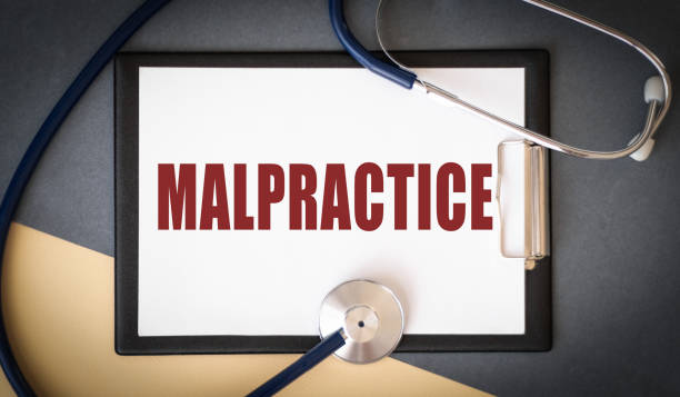istock Concept of Malpractice Text written in paper 2190617279