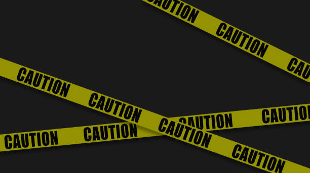 istock Caution and danger tapes. Warning tape. Black and yellow line striped. Abstract warning lines for police, accident, under construction 2190617284