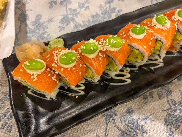 Gourmet Sushi Roll with Salmon and Wasabi on Elegant Plate