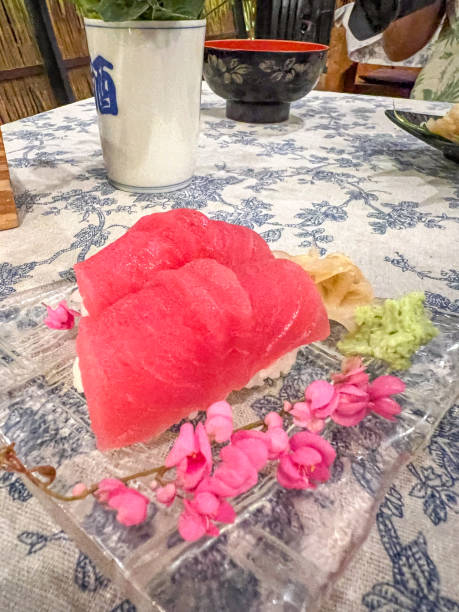 Sushi and Wasabi Platter with Soup in a Rustic Restaurant Setting