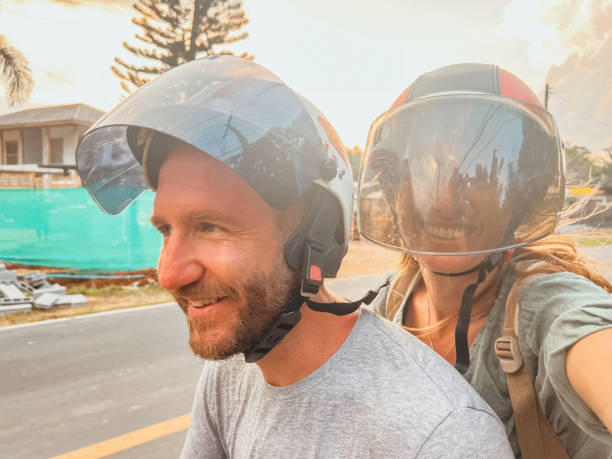 istock Couple Smiling on Motorcycle Ride Through Countryside 2190620418