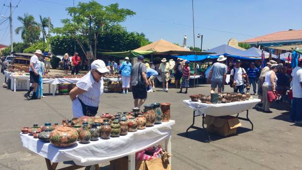 Puerto Corinto Nicaragua April 16,20217 Cruise passengers shopping at a market in the town square of Corinto