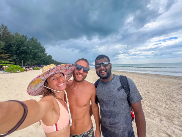 istock Friends Taking a Selfie on a Tropical Beach 2190622405