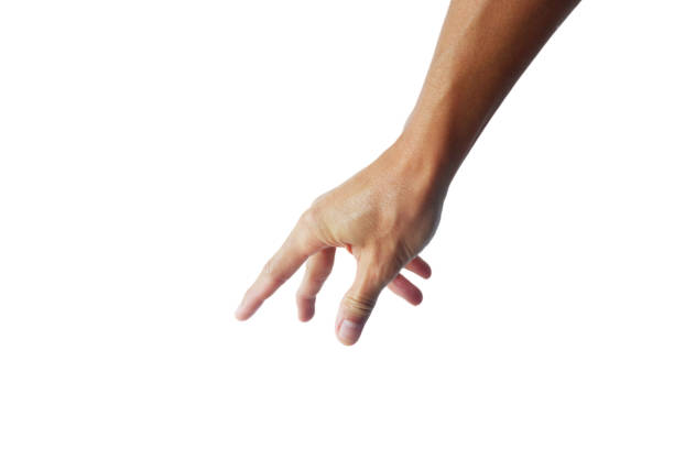 A man's hand in a gesture of reaching down to grab or hold something.