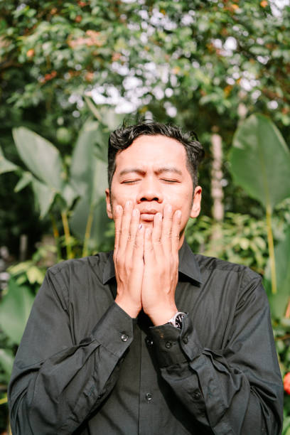 istock A Southeast Asian man holding his cheek, 2190625577